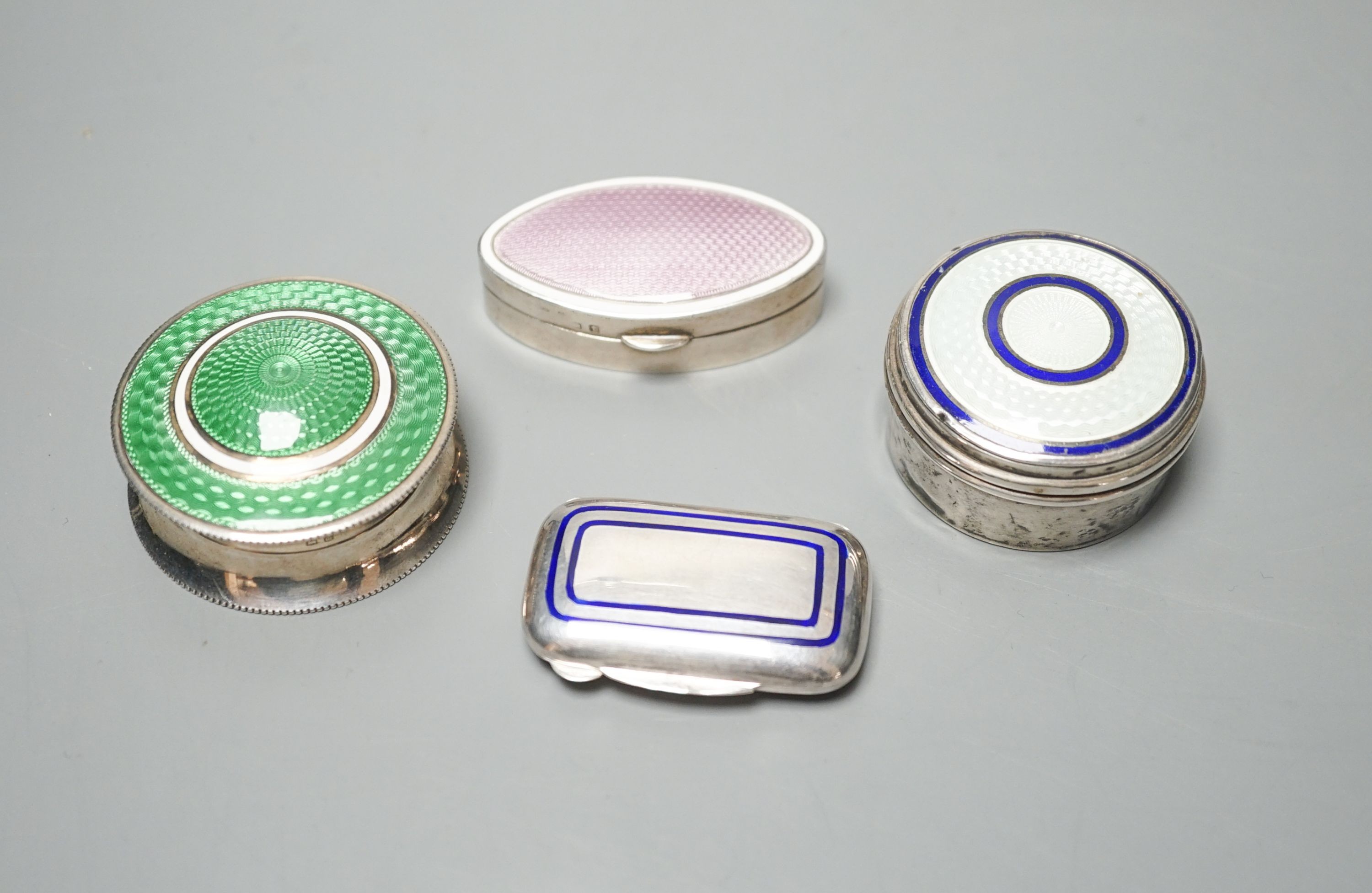 Three assorted early 20th century silver and enamel pill boxes, largest 49mm and a later similar Italian 925 box.